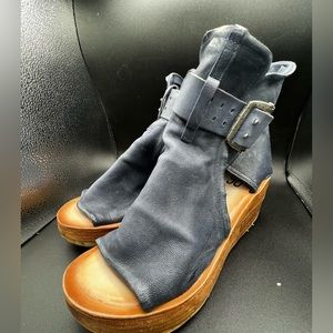gladiator-style wedge sandals are made from fine Italian leather w/a 2.75 heel.